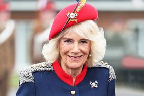 Queen Camilla smiles during a visit to The Royal Lancers on April 22, 2024 in Catterick, England.