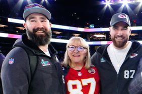 pening Night At The Footprint Centre - NFL Network's Michael Irvin interviews Kansas City Chiefs tight end Travis Kelce right with his brother Philadelphia Eagles center Jason Kelce and their mother Donna Kelce