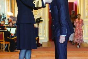 Daniel Craig is made a Companion of the Order of St Michael and St George by the Princess Royal during an investiture ceremony at Windsor Castle