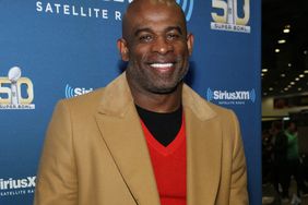 Deion Sanders visits the SiriusXM set at Super Bowl 50 Radio Row at the Moscone Center on February 4, 2016 in San Francisco, California