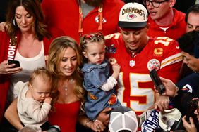  Kansas City Chiefs' quarterback #15 Patrick Mahomes with his wife Brittany Mahomes and their children Patrick Bronze and Sterling Skye celebrate winning Super Bowl LVIII