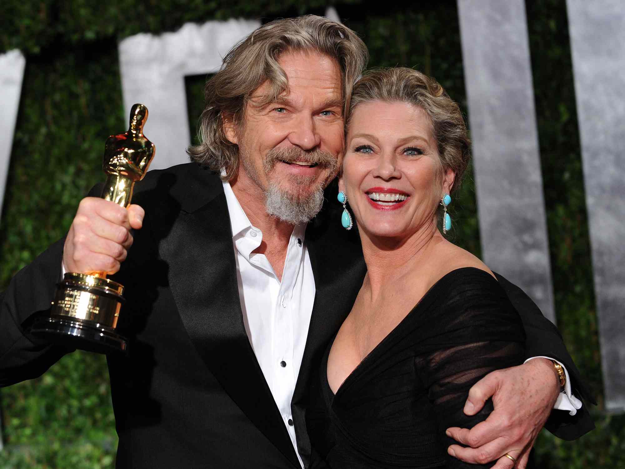 Jeff Bridges (L) and Susan Geston arrive at the 2010 Vanity Fair Oscar Party hosted by Graydon Carter held at Sunset Tower on March 7, 2010 in West Hollywood, California