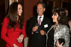  Catherine, Duchess of Cambridge meets Richard E Grant and Joan Collins during the Dramatic Arts reception at Buckingham Palace on February 17, 2014 in London, England. 