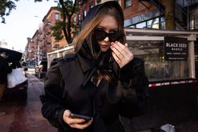 Fake Russian-German heiress Anna Sorokin leaves her apartment on October 11, 2022 in New York. - Sorokin, the young Russian-German woman who bilked wealthy New Yorkers while pretending to be an heiress herself, has said she would fight deportation to Germany after her recent release from prison.