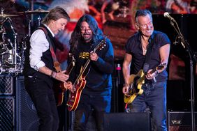 Mandatory Credit: Photo by Joel C Ryan/Invision/AP/Shutterstock (13000512af) Paul McCartney, from left, Dave Grohl and Bruce Springsteen perform at Glastonbury Festival in Worthy Farm, Somerset, England 2022 Day 2, Glastonbury, United Kingdom - 25 Jun 2022