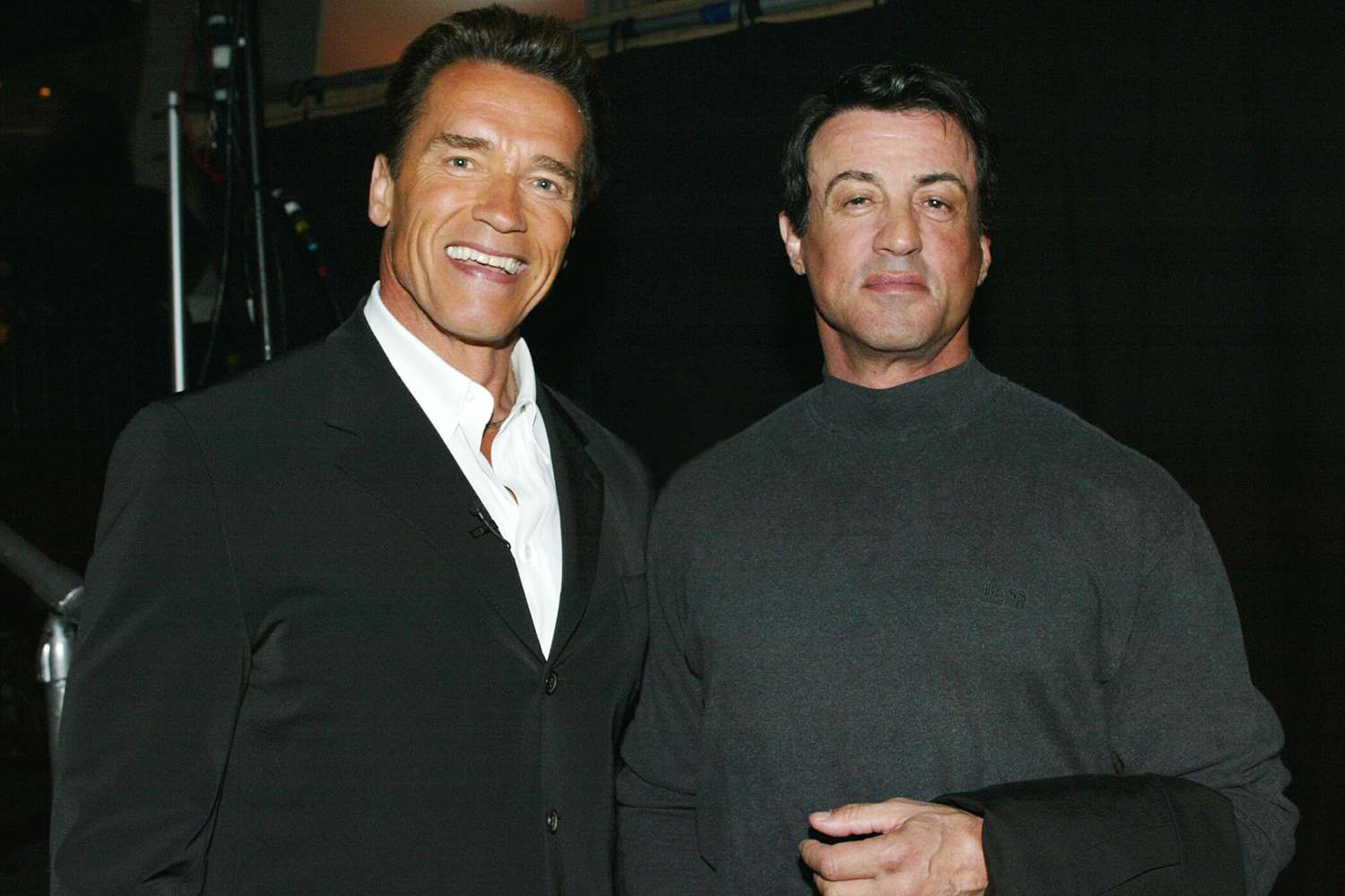 Arnold Schwarzenegger and Sylvester Stallone at the "2002 World Stunt Awards" at Barker Hanger, Santa Monica , Ca. Sunday, May 19, 2002.