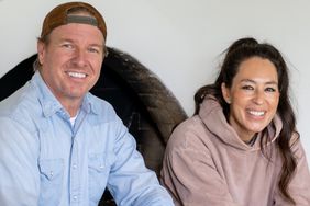 Hosts Chip and Joanna Gaines walk through the Lakehouse, as seen on Fixer Upper: The Lakehouse.