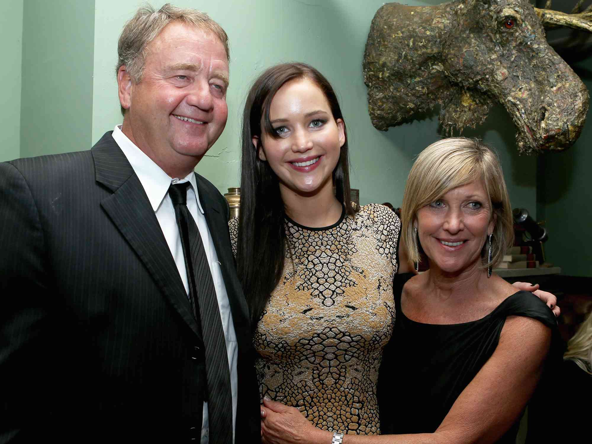 Gary Lawrence, Jennifer Lawrence, and Karen Lawrence at The Weinstein Company film premiere party for 'Silver Linings Playbook' in 2012.