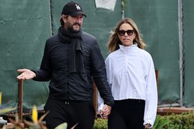 Christine Baumgartner and her new boyfriend and financier Josh Connor are seen on a cozy stroll together after denying in court that there was a romantic 
