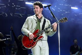  Nick Jonas performs onstage during Jonas Brothers Five Albums, One Night