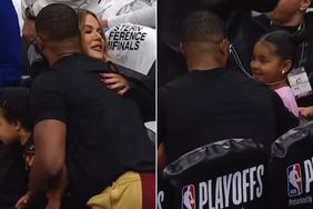Khloe Kardashian interacts with Tristan Thompson and their daughter True in Cleveland, OH during the 2024 NBA Playoffs
