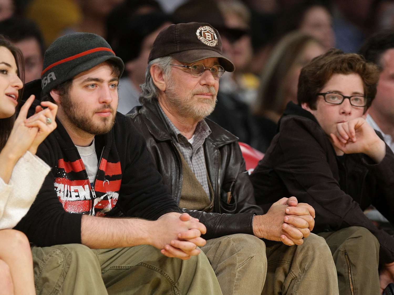 Steven Spielberg (center) and his sons Sawyer (R), and Max (L) attend the Los Angeles Lakers vs Portland Trailblazers game at the Staples Center on April 2, 2008 in Los Angeles, California