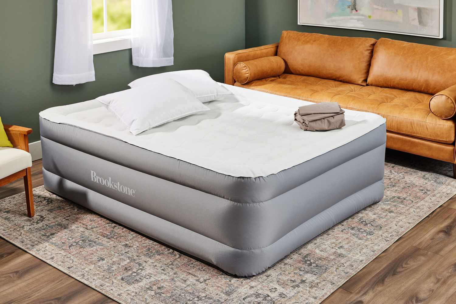 The Brookstone Perfect Queen Air Mattress with Built-in Pump after being inflated