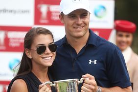 Jordan Spieth of the United States and girlfriend Annie Verret pose with the Stonehaven trophy after winning the 2016 Australian Open during day four of the 2016 Australian golf Open at Royal Sydney Golf Club on November 20, 2016 in Sydney, Australia