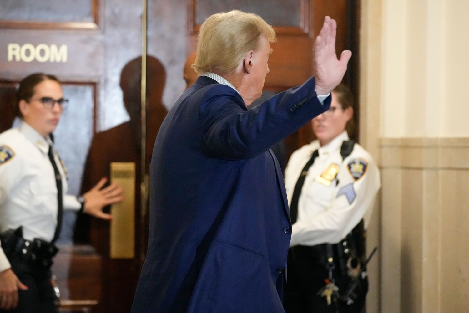 Former President Donald Trump motions as he returns to the courtroom after a break in his civil business fraud trial at New York Supreme Court, Wednesday, Oct. 25, 2023, in New York