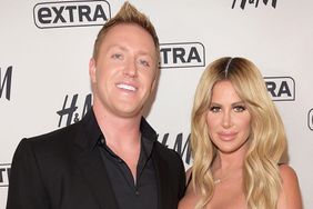 Kroy Biermann and television personality Kim Zolciak visit "Extra" at H&M Times Square on October 3, 2017 in New York City.