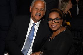 Stedman Graham and Oprah Winfrey attend The Robin Hood Foundation's 2018 benefit at Jacob Javitz Center on May 14, 2018 in New York City