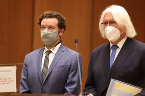 Danny Masterson (L) stands with his lawyer Thomas Mesereau as he is arraigned on three rape charges