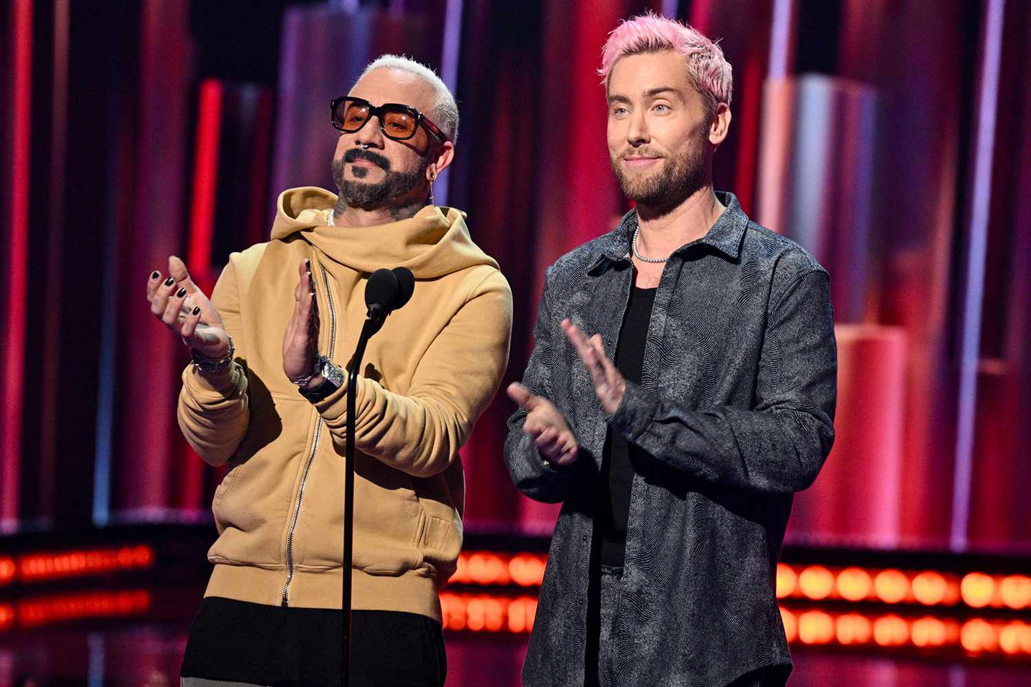 AJ McLean and Lance Bass speak onstage at the 2024 iHeartRadio Music Awards