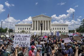 Abortion-rights protesters demonstrate outside the Supreme Court in Washington, Saturday, June 25, 2022. The Supreme Court has ended constitutional protections for abortion that had been in place nearly 50 years, a decision by its conservative majority to overturn the court's landmark abortion cases. (AP Photo/Gemunu Amarasinghe)