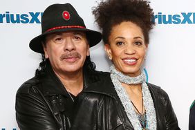 NEW YORK, NY - AUGUST 02: (EXCLUSIVE COVERAGE) (L-R) Musician Carlos Santana and wife Cindy Blackman visit the SiriusXM Studios on August 2, 2017 in New York City. (Photo by Astrid Stawiarz/Getty Images)