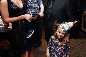 Billy Joel with wife and 2 daughters