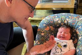 Andy Cohen's Newborn Daughter Lucy Meets 'Uncle' Anderson Cooper