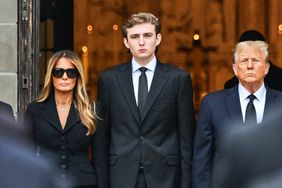 Former US President Donald Trump (center right) stands with his wife Melania Trump (center left) their son Barron Trump (center) and father-in-law Viktor Knavs (out of frame), as the coffin carrying the remains of Amalija Knavs, the former first lady's mother, is carried into the Church of Bethesda-by-the-Sea for her funeral, in Palm Beach, Florida, on January 18, 2024. Former first lady Melania Trump's mother Amalija Knavs, 78, died January 9, 2024 in Miami following an undisclosed illness. 