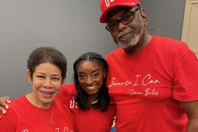 Simone Biles with her parents