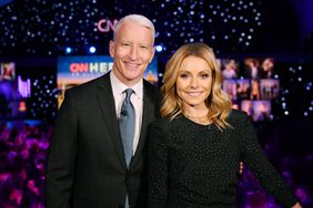 NEW YORK, NY - DECEMBER 09: Kelly Ripa (L) and Anderson Cooper host the 12th Annual CNN Heroes: An All-Star Tribute at American Museum of Natural History on December 9, 2018 in New York City. (Photo by Mike Coppola/Getty Images for CNN)