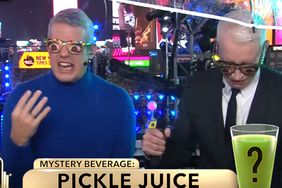 See Anderson Cooper and Andy Cohen take shots of mystery liquid