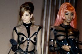 Mandatory Credit: Photo by Neville Marriner/ANL/Shutterstock (1822697a) Fashion Women 1990 Model's Cindy Crawford (left) And Naomi Campbell On The Paris Catwalk Wearing Thierry Mugler. Fashion Women 1990 Model's Cindy Crawford (left) And Naomi Campbell On The Paris Catwalk Wearing Thierry Mugler.