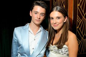 Noah Schnapp and Millie Bobby Brown attend 2020 Netflix SAG After Party at Sunset Tower on January 19, 2020 in Los Angeles, California.