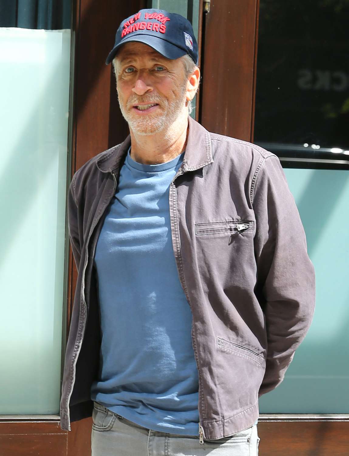 Jon Stewart leaves the Greenwich Hotel after interviewing Queen Noor in New York City.