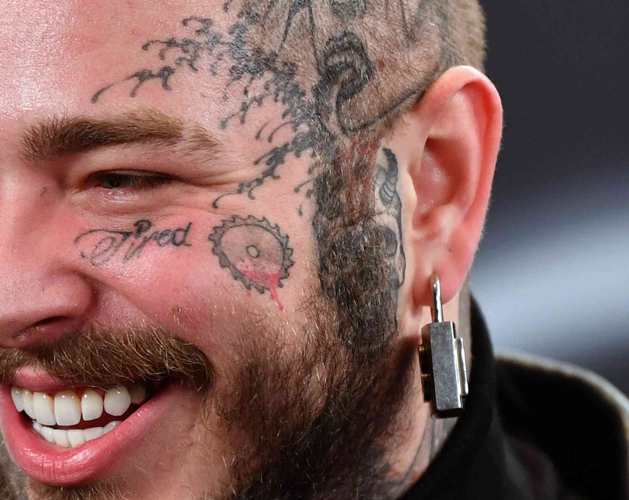 Post Malone (tattoo detail) poses backstage at the 2020 Billboard Music Awards, broadcast on October 14, 2020 at the Dolby Theatre in Los Angeles, CA