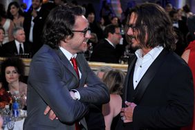 Robert Downey Jr., Johnny Depp during the 68th Annual Golden Globe Awards held at the Beverly Hilton Hotel
