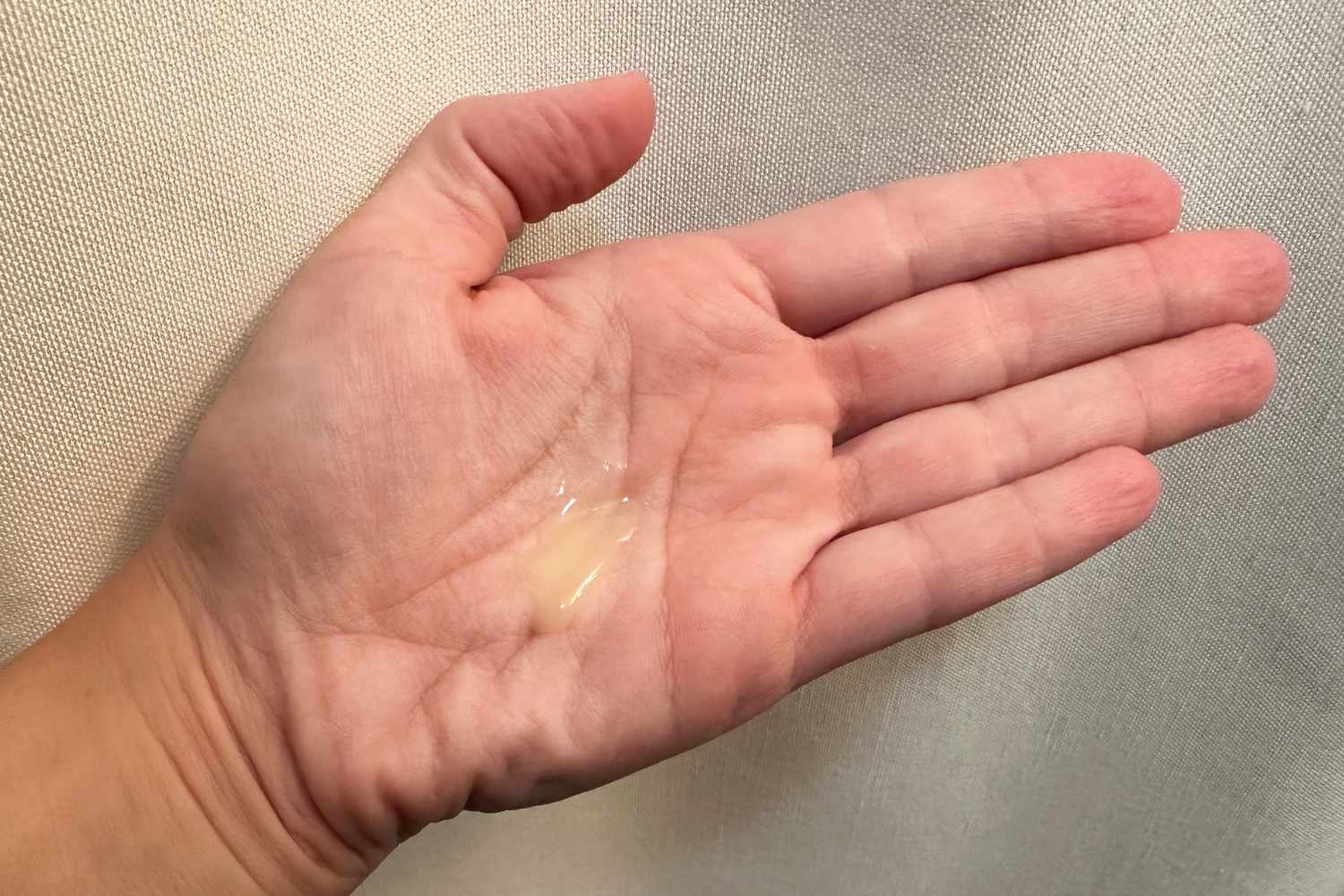 The palm of a hand with La Roche Posay Retinol B3 Pure Retinol Serum in it
