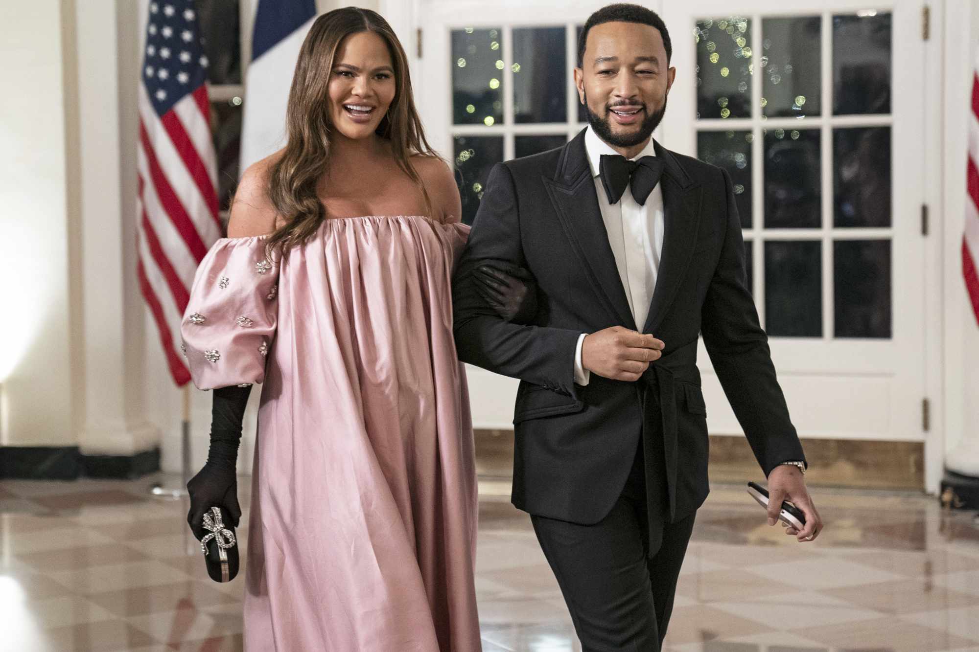 US singer John Legend and US model Chrissy Teigen arrive to attend the State Dinner in honor of French President Emmanuel Macron and wife Brigitte Macron hosted by US President Joe Biden and first lady Dr. Jill Biden at the White House, in Washington, DC, USA, 01 December 2022. This will be the first state dinner of President Biden's presidency and a chance for the US and France to strengthen ties that have frayed due to disputes over trade and national security. The Bidens host a State Visit by President Macron and Mrs. Marcon of France, Washington, USA - 01 Dec 2022