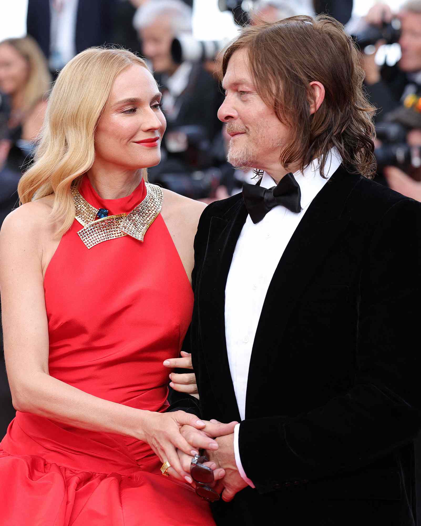 Diane Kruger and US actor Norman Reedus arrive for the screening of the film "The Innocent (L'Innocent)" during the 75th edition of the Cannes Film Festival in Cannes, southern France, on May 24, 2022