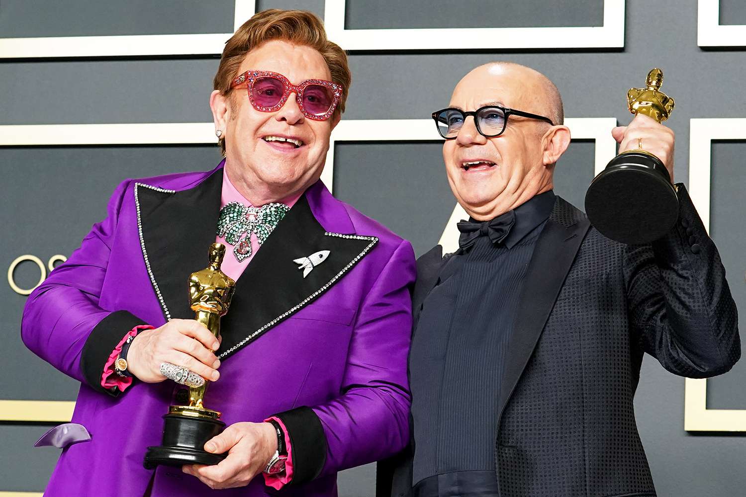 Elton John and Bernie Taupin, winners of Best Original Song for "(I'm Gonna) Love Me Again, 'Rocketman'", pose in the press room during 92nd Annual Academy Awards at Hollywood and Highland on February 09, 2020 in Hollywood, California. 