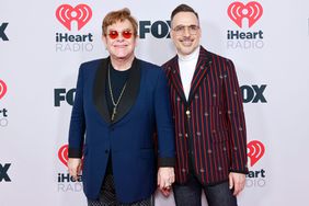 LOS ANGELES, CALIFORNIA - MAY 27: (EDITORIAL USE ONLY) (L-R) Honoree Elton John and David Furnish attend the 2021 iHeartRadio Music Awards at The Dolby Theatre in Los Angeles, California, which was broadcast live on FOX on May 27, 2021. (Photo by Emma McIntyre/Getty Images for iHeartMedia)