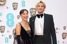 Millie Bobby Brown and Jake Bongiovi attend the EE British Academy Film Awards 2022 at Royal Albert Hall on March 13, 2022 in London, England.