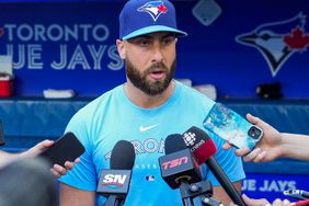TORONTO, ON - MAY 30: Anthony Bass #52 of the Toronto Blue Jays makes a statement to the media before playing the Milwaukee Brewers in their MLB game at the Rogers Centre on May 30, 2023 in Toronto, Ontario, Canada. (Photo by Mark Blinch/Getty Images)