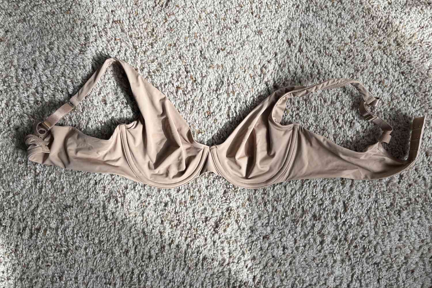 ThirdLove 24/7 Second Skin Unlined Bra laying on carpet