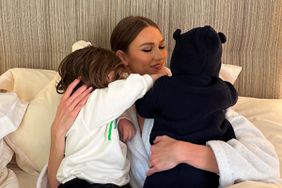 Karlie Kloss cuddles with her kids