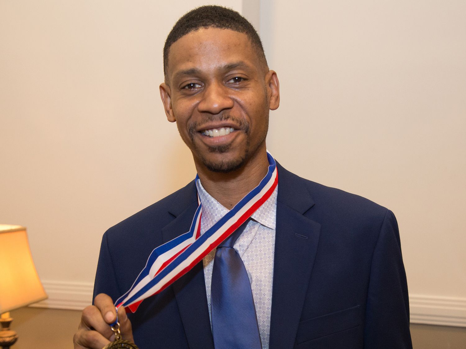 Kecalf Franklin, Son of Aretha Franklin poses with the Legacy Award