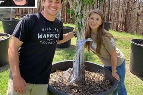 Bindi Irwin with Russell Crowe's plant