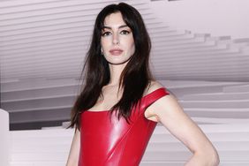Anne Hathaway attends the Versace fashion show during the Milan Fashion Week Womenswear Fall/Winter 2024-2025 on February 23, 2024 in Milan, Italy.