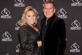 NASHVILLE, TENNESSEE - NOVEMBER 20: Julie Chrisley (L) and Todd Chrisley attend the grand opening of E3 Chophouse Nashville on November 20, 2019 in Nashville, Tennessee. (Photo by Danielle Del Valle/Getty Images for E3 Chophouse Nashville)