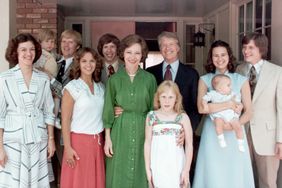 A portrait of President Jimmy Carter and his extended family. Left to right: Judy (Mrs. Jack Carter); Jason James Carter; Jack (John William Carter); Annette (Mrs. Jeff Carter); Jeff (Donnel Jeffrey Carter); First Lady Rosalynn Carter; daughter Amy Lynn Carter; President Carter; daughter-in law Caron Griffin Carter holding James Earl Carter IV; and son Chip (James Earl Carter III). 1977-1980. | Location: outdoors. (Photo by © CORBIS/Corbis via Getty Images)